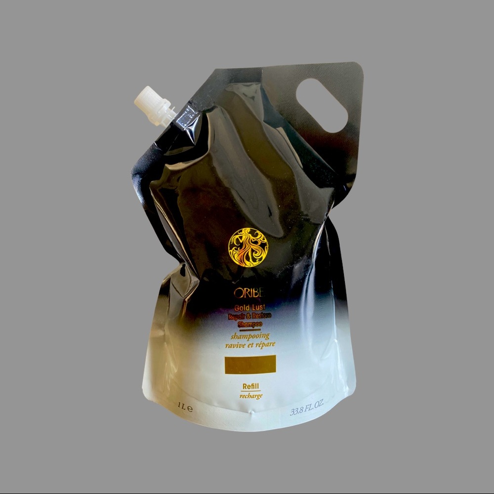 - TWO PACK!!! 33.8 fl oz Oribe Gold Lust Shampoo. Refill size .
